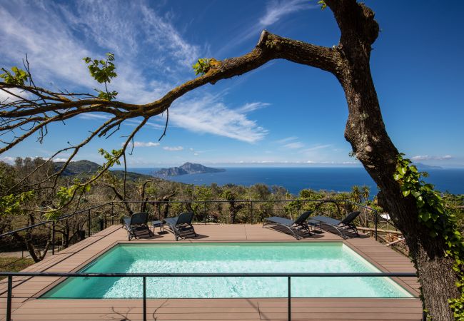 pool side, with capri and sea views, sunny day